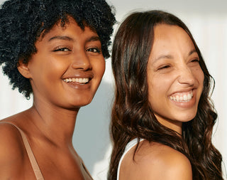 Two girls smiling